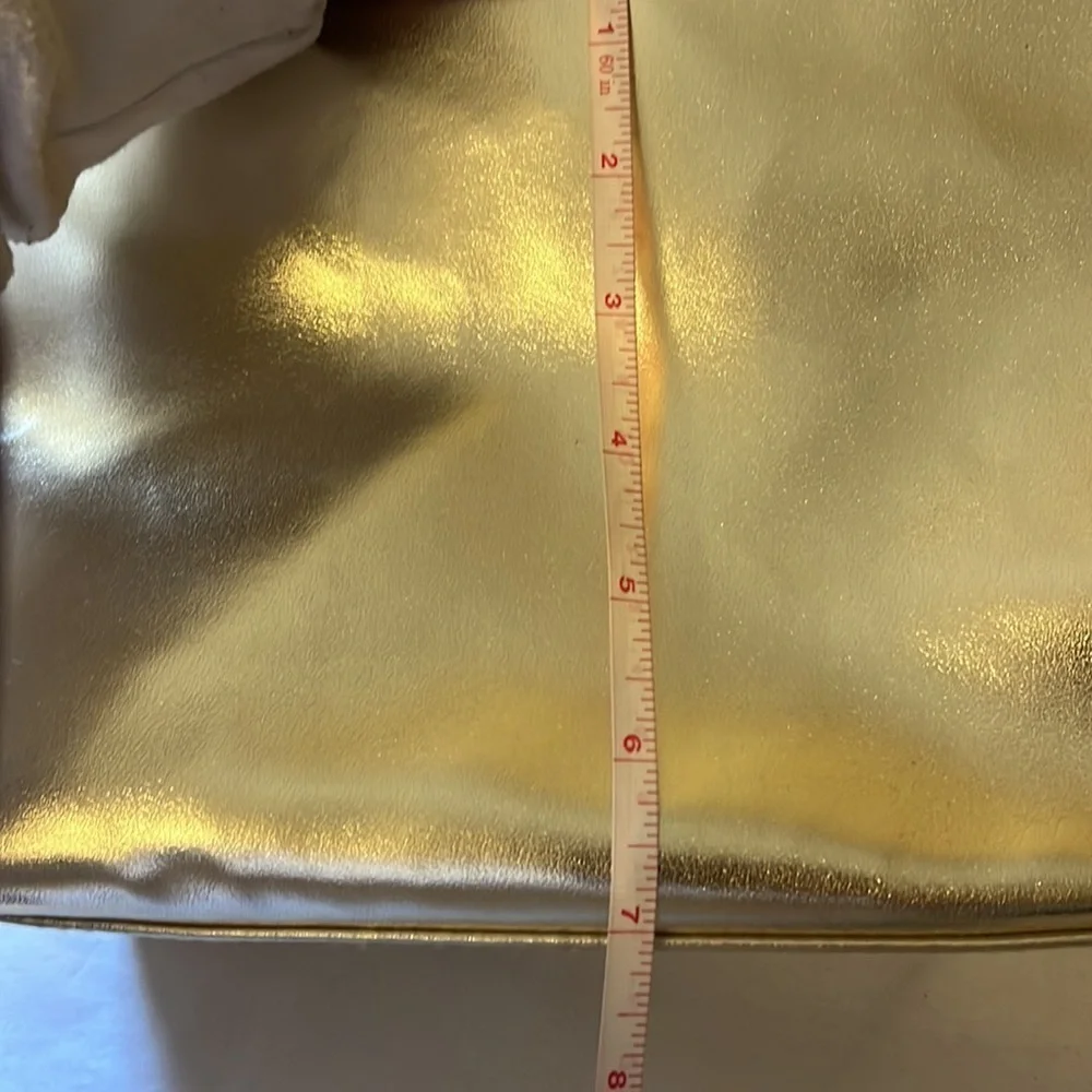 Gold Victoria’s Secret cosmetics/ small carrying bag with handle, studded heart